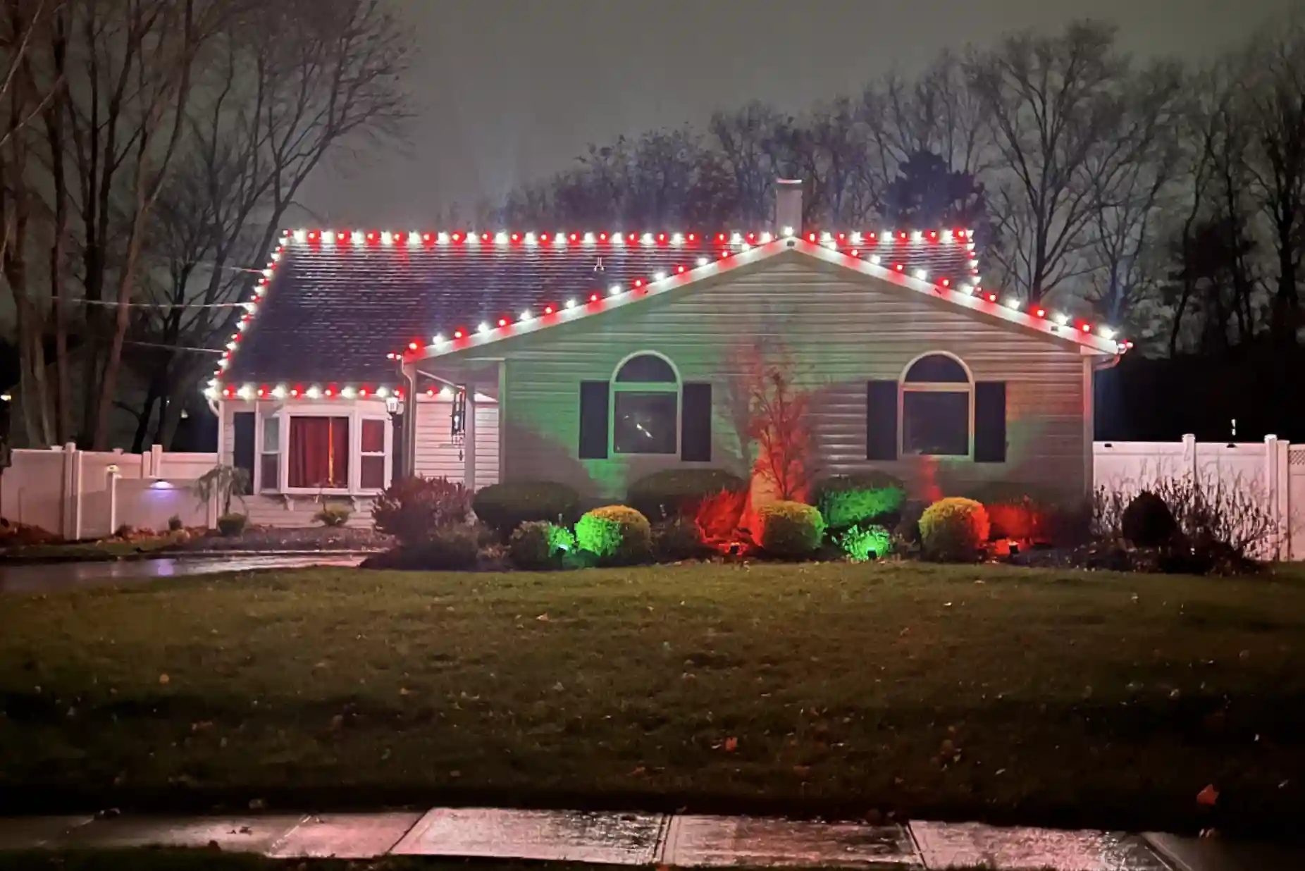 Professional roofline holiday lights installation in Long Island by Dr. Glow