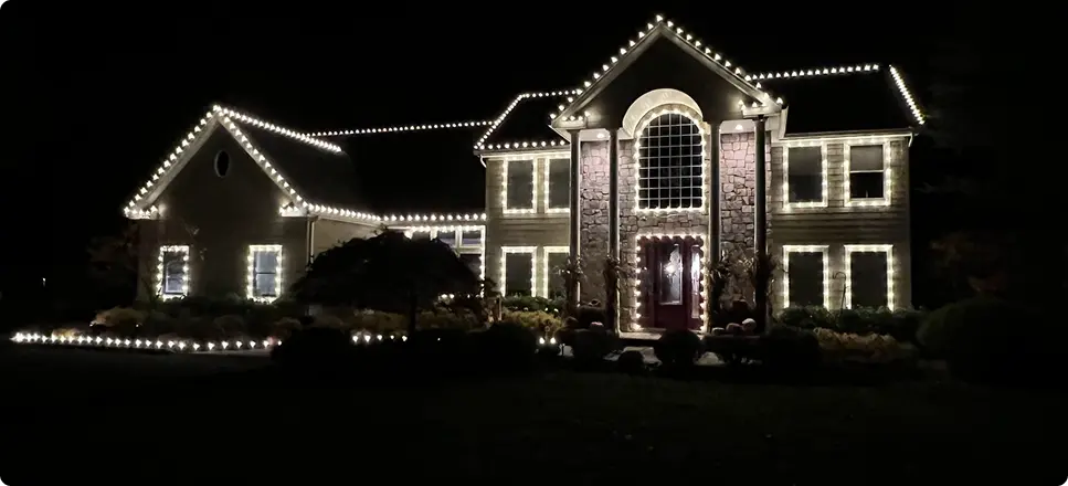 Stunning holiday lighting installations by Dr. Glow in Long Island homes and businesses